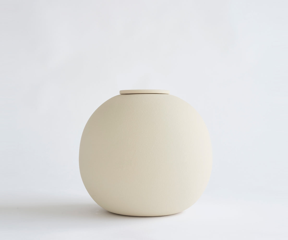 DIONA - handmade eco urn in soft beige engobe