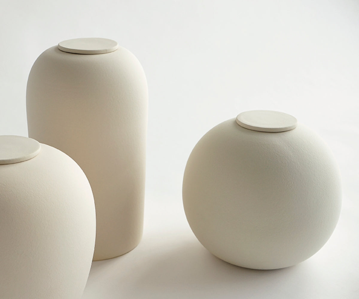 DIONA - handmade eco urn in soft beige engobe